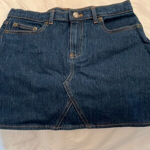 Super cute J.Crew jean skirt with heart pocket.  Worn only once; girl’s size 12.